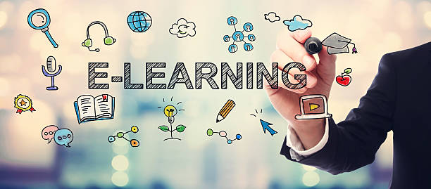 Businessman drawing E-Learning concept on blurred abstract background